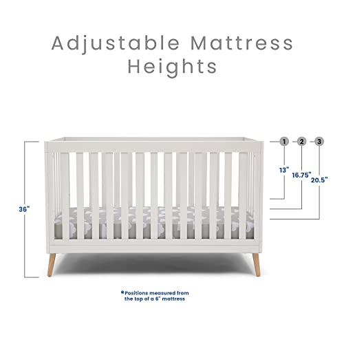 Delta Children Essex 4-in-1 Convertible Baby Crib, Bianca White with Natural Legs